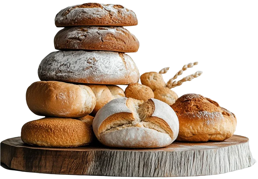 A stack of assorted breads on a wooden board